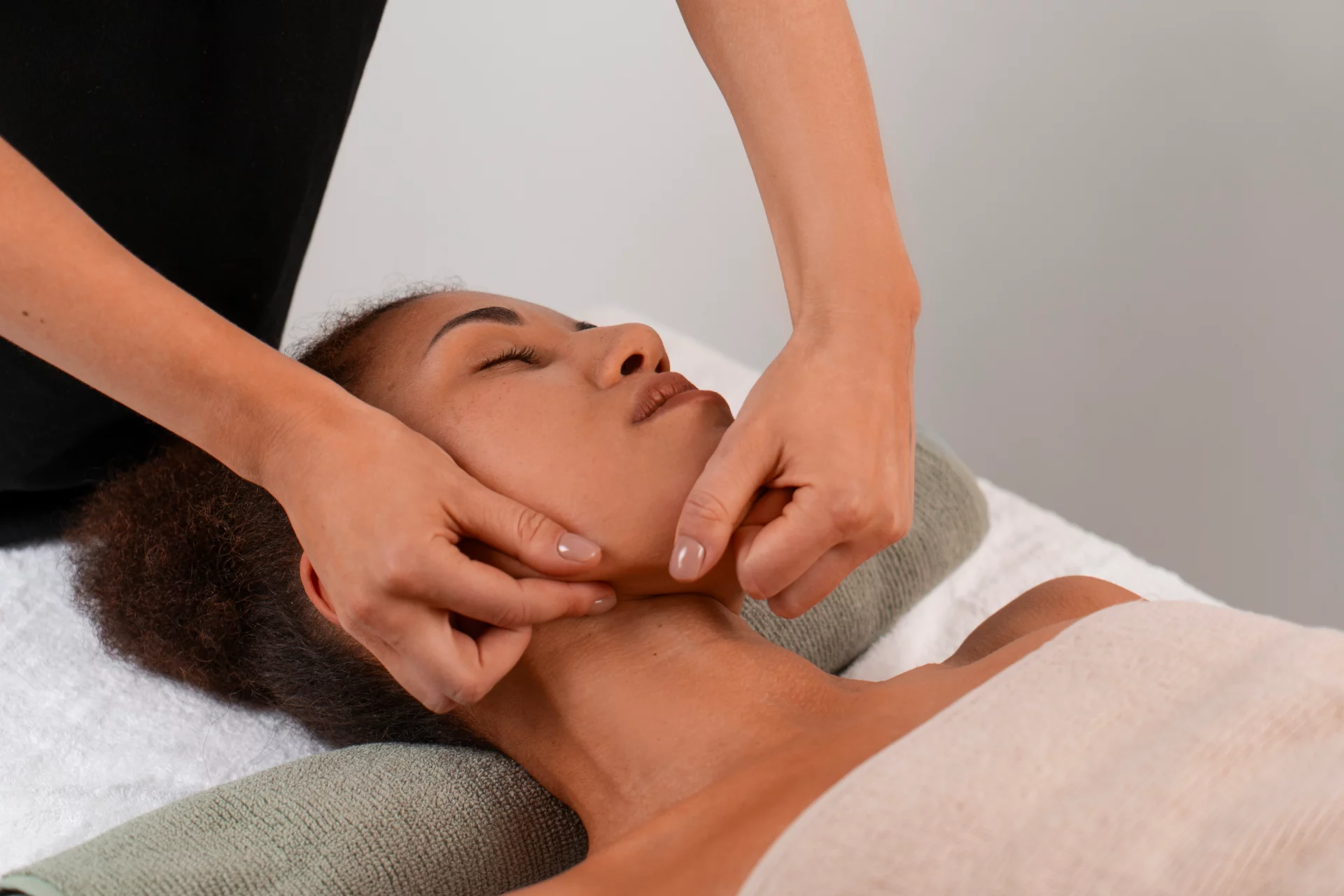 view-woman-getting-facial-yoga-massage-stay-young
